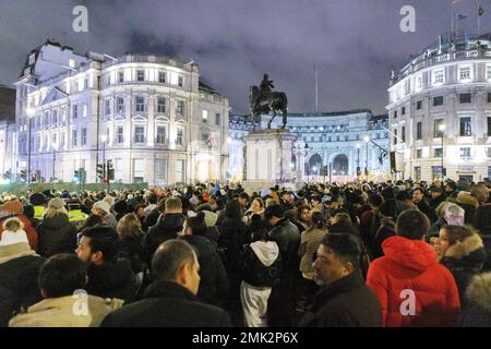 Crowds gather around Trafalgar Square ahead of New Year’s Eve firework celebrations in London tonight.   Image shot on 31st Dec 2022.  © Belinda Jiao Stock Photo