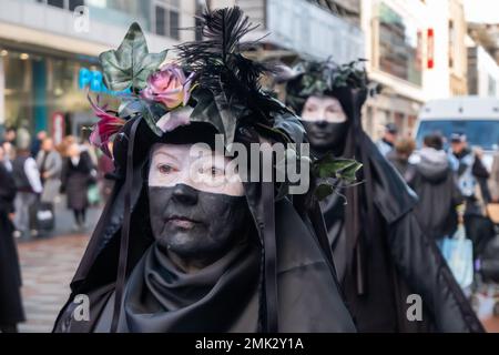 Glasgow, Scotland, UK. 28th January, 2023. Members of The Oil Slicks, environmental campaigners from the group Extinction Rebellion protesting in Argyle Street outside the premises of Barclays Bank. Credit: Skully/Alamy Live News Stock Photo