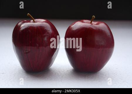 Close up photo of two colored apples that are ripe and ready to eat. Stock Photo
