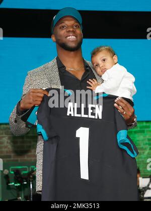 Kentucky linebacker Josh Allen holds his new team jersey after the  Jacksonville Jaguars selected Allen in