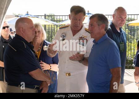 ANNAPOLIS, Md. (Sept. 03, 2022) Maryland Gov. Larry Hogan; Delaware Gov. John Charles Carney Jr.; U.S. Naval Academy Superintendent Vice Adm. Sean Buck during the pre-game celebration of the 2022 US Navy football season against University of Delaware. As the undergraduate college of our country's naval service, the Naval Academy prepares young men and women to become professional officers of competence, character, and compassion in the U.S. Navy and Marine Corps. Stock Photo