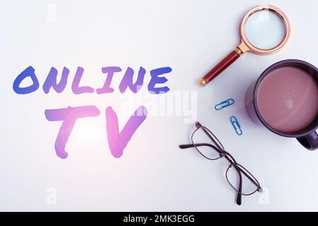 Handwriting text Online Tv. Business concept a television production broadcast in real-time as events happen Stock Photo
