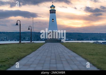 Sunset photo of the Myers Point Lighthouse at Myers Park in Lansing NY, Tompkins County. The lighthouse is situated on the shore of Cayuga Lake,. Stock Photo