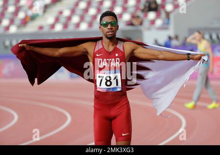 Qatar's Abderrahman Samba celebrates after winning the men's 400m