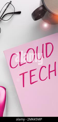 Hand writing sign Cloud Tech. Word for storing and accessing data and programs over the Internet Stock Photo