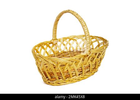 An empty wicker basket isolated on white background. Easter item Stock Photo