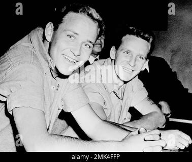 Smiling George R. York, 18, left, and James D. Latham, 19, pictured 