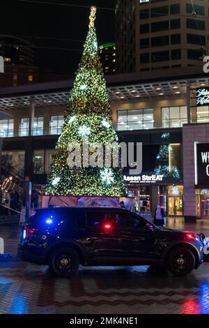 Seattle, USA. 29th Dec, 2022. Early in the evening Police responding to the Westlake Center for a shoplifitng call. Stock Photo