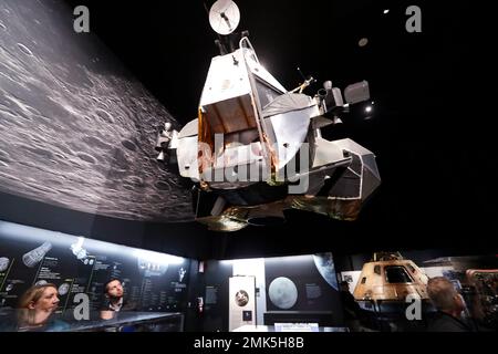 The NASA Apollo 11 command module Columbia, right, sits as the