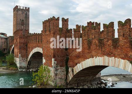 Panoramic view of Castelvecchio Bridge in Verona, Italy showcasing its historic arch bridge design and scenic surroundings Stock Photo