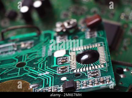 Black blob on electronic circuit. Integrated Circuit. Chip on Board (COB). Stock Photo