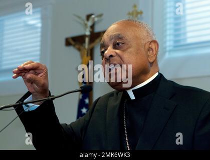 Archbishop designated by Pope Francis to the Archdiocese of Washington,  Archbishop Wilton D. Gregory, speaks during a news conference as Cardinal  Donald Wuerl looks on, at Washington Archdiocesan Pastoral Center in  Hyattsville