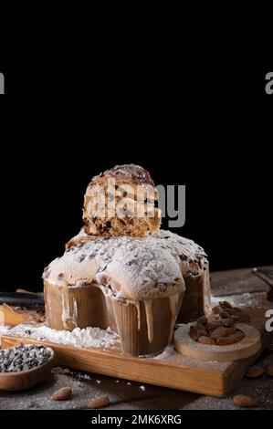 Colomba with chocolate. Easter Italian cake with almonds and chocolate in the shape of a dove. Festive pastries are traditional in Italy.  Stock Photo