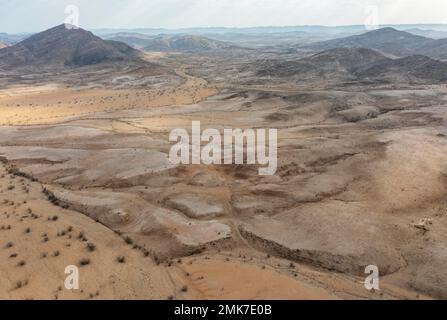 Badlands and dry river beds after years of drought, aerial view, drone shot, Kaokoland, Kunene Region, Namibia Stock Photo