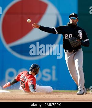 CLEVELAND, OH - May 30: Jake Bauers (10) of the Cleveland Indians takes the  throw at first base ahead of Reese McGuire (7) of the Toronto Blue Jays du  Stock Photo - Alamy