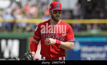 Philadelphia Phillies' Bryce Harper gets ready to throw a ball before a spring  training baseball game against the Toronto Blue Jays Saturday, March 9,  2019, in Clearwater, Fla. (AP Photo/Chris O'M …