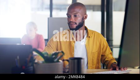 Information technology, research and businessman on computer, laptop and keyboard for software development, website and system update. Programming Stock Photo