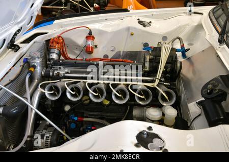 Scarperia, 3 April 2022: Engine detail of BMW 3.0 CSL 1975 in the box during Mugello Classic 2022 at Mugello Circuit in Italy. Stock Photo