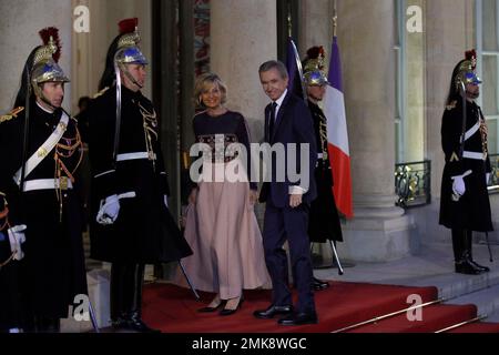 Bernard Arnault and Hélène Arnault arrives in the “Booksellers Area” of the  White House to attend a state dinner honoring France's President Emmanuel  Macron on April 24, 2018 in Washington, DC. Photo