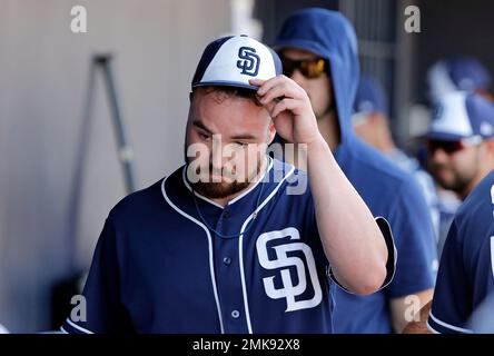 A Chicago Cubs spring training cap sits on the bench during the first  inning of a spring training baseball game against the Arizona Diamondbacks,  Monday, Feb. 27, 2023, in Scottsdale, Ariz. (AP