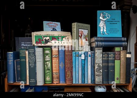 Vintage books on display in the window of a secondhand bookkshop in Edinburgh, Scotland, UK. Stock Photo