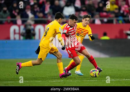 Girona, Spain. 28th Jan, 2023. Pedri (FC Barcelona), Arnau (Girona FC) and Gavi (FC Barcelona) during La Liga football match between Girona FC and FC Barcelona, at Montilivi Stadium on January 28, 2023 in Girona, Spain. Foto: Siu Wu Credit: dpa/Alamy Live News Stock Photo