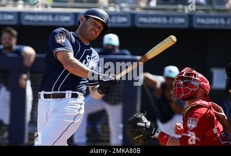 San Diego Padres' Manny Machado hits against the San Francisco Giants  during the first inning of a spring training baseball game, Saturday, March  2, 2019, in Peoria, Ariz. (AP Photo/Matt York Stock