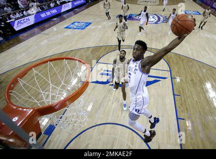 Duke's RJ Barrett (5) goes up for a dunk on a break away in front of  Pittsburgh's Malik Ellison (3) during the second half of an NCAA college  basketball game, Tuesday, Jan.