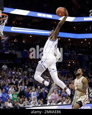 Duke's RJ Barrett (5) goes up for a dunk on a break away in front of  Pittsburgh's Malik Ellison (3) during the second half of an NCAA college  basketball game, Tuesday, Jan.