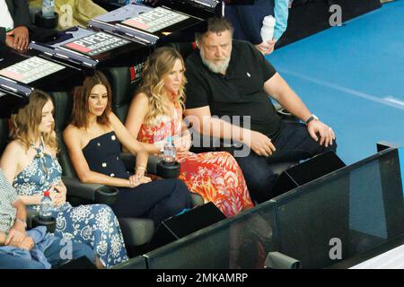 Melbourne, Australia. 28th Jan, 2023. Australian actor Russell Crowe (R) and Britney Theriot (L) watch the Women's Singles Final match between Elena Rybakina of Kazakhstan and Aryna Sabalenka on day 13 of the 2023 Australian Open at Melbourne Park in Melbourne, Australia. Sydney Low/Cal Sport Media/Alamy Live News Stock Photo