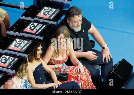 Melbourne, Australia. 28th Jan, 2023. Australian actor Russell Crowe (R) and Britney Theriot (L) watch the Women's Singles Final match between Elena Rybakina of Kazakhstan and Aryna Sabalenka on day 13 of the 2023 Australian Open at Melbourne Park in Melbourne, Australia. Sydney Low/Cal Sport Media/Alamy Live News Stock Photo