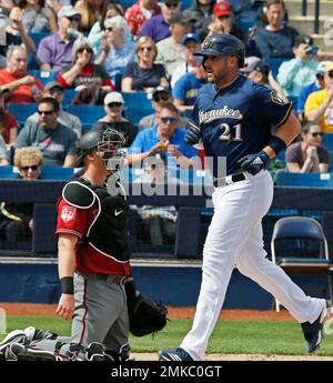 Arizona Diamondbacks second baseman Josh Rojas, center, throws to first  base after forcing out Philadelphia Phillies' Travis Jankowski at second on  a fielder's choice hit into by Odubel Herrera during the seventh