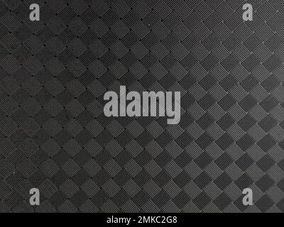 Close-up black power bank body background and texture. Stock Photo