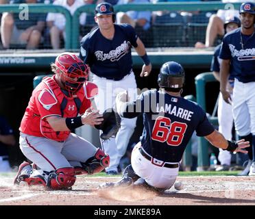 Jorge Mateo, of the Oakland Athletics, tags out Cristian Pache, of the  Atlanta Braves, during the seventh inning of the MLB All-Star Futures  baseball game, Sunday, July 7, 2019, in Cleveland. The