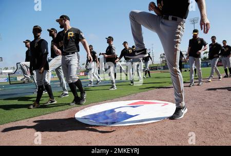 Pittsburgh Pirates players warm up during a workout at Busch Stadium,  Wednesday, Oct. 2, 2013, in St. Louis. Game 1 of the National League  Division Series baseball playoff between the Pirates and