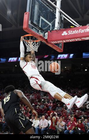 Arkansas forward Daniel Gafford dunks during practice at the NCAA men's ...