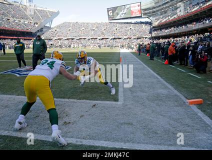 Green Bay Packers fans wear cheese hats while Buffalo Bills fans wear  chicken wing hats during the first half of an NFL football game against the  Buffalo Bills Sunday, Dec. 14, 2014