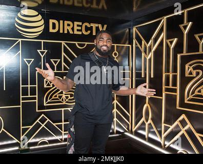 IMAGE DISTRIBUTED FOR DIRECTV'S NFL SUNDAY TICKET - Sterling Shepard, left,  with a DIRECTV NFL SUNDAY TICKET subscriber at DIRECTV NFL SUNDAY TICKET  Lounge on Saturday, Feb. 2, 2019, in Atlanta. (Phil