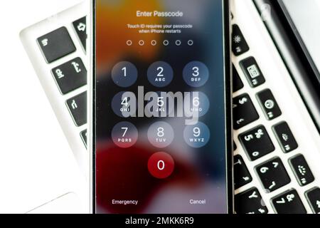 Enter Password to unlock Screen Interface of iPhone. January 23, 2023, Swat, Pakistan Stock Photo
