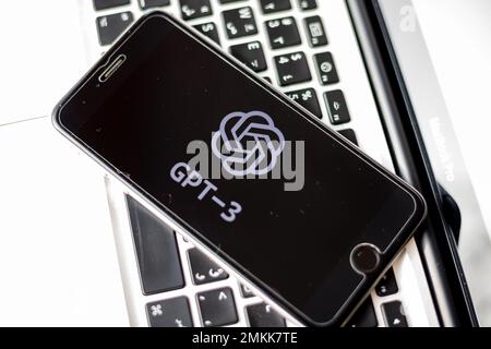 GPT-3 with logo on mobile screen with black background. January 23, 2023, Swat, Pakistan Stock Photo