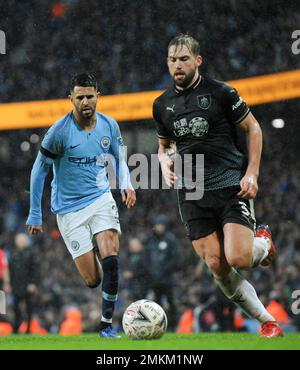 Istanbul, Turquie. 10th June, 2023. Riyad Mahrez of Manchester City and Taylor  Ward celebrate with the trophy following the UEFA Champions League Final  football match between Manchester City FC and FC Internazionale (