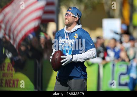 NFC wide receiver Adam Thielen (19), of the Minnesota Vikings, scores a  touchdown as AFC defensive back A.J. Buoy (21), of the Jacksonville Jaguars  defends, during the first half of the NFL