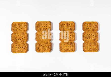 Top view of delicious crispy crunchy cracker snacks isolated on white background Stock Photo