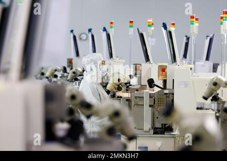 SUQIAN, CHINA - JANUARY 29, 2023 - Workers make electronic chips at a workshop in Suqian, East China's Jiangsu Province, Jan 29, 2023. (Photo by CFOTO/Sipa USA)