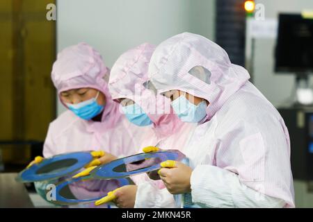SUQIAN, CHINA - JANUARY 29, 2023 - Workers make electronic chips at a workshop in Suqian, East China's Jiangsu Province, Jan 29, 2023. (Photo by CFOTO/Sipa USA)