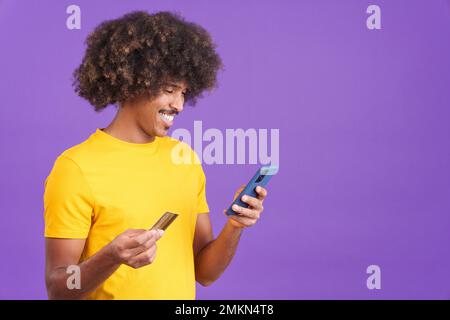 African man using the mobile and card to shopping online Stock Photo