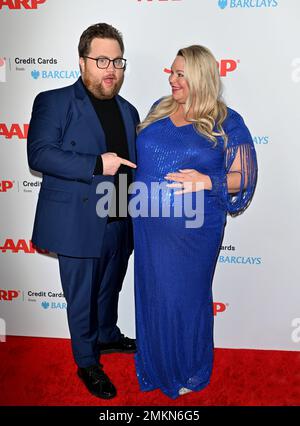 Paul Walter Hauser and his wife Amy pose together at the premiere of ...