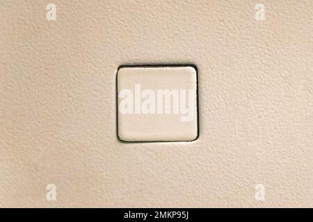 White empty metal button in an elevator cabin in the bright background Stock Photo