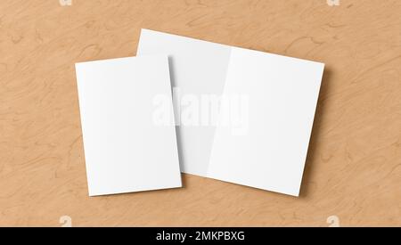 Half-folded flyer A4 booklet mock up on wooden background Stock Photo