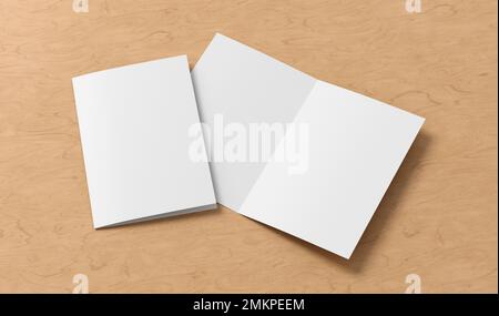 Half-folded flyer A4 booklet mock up on wooden background Stock Photo